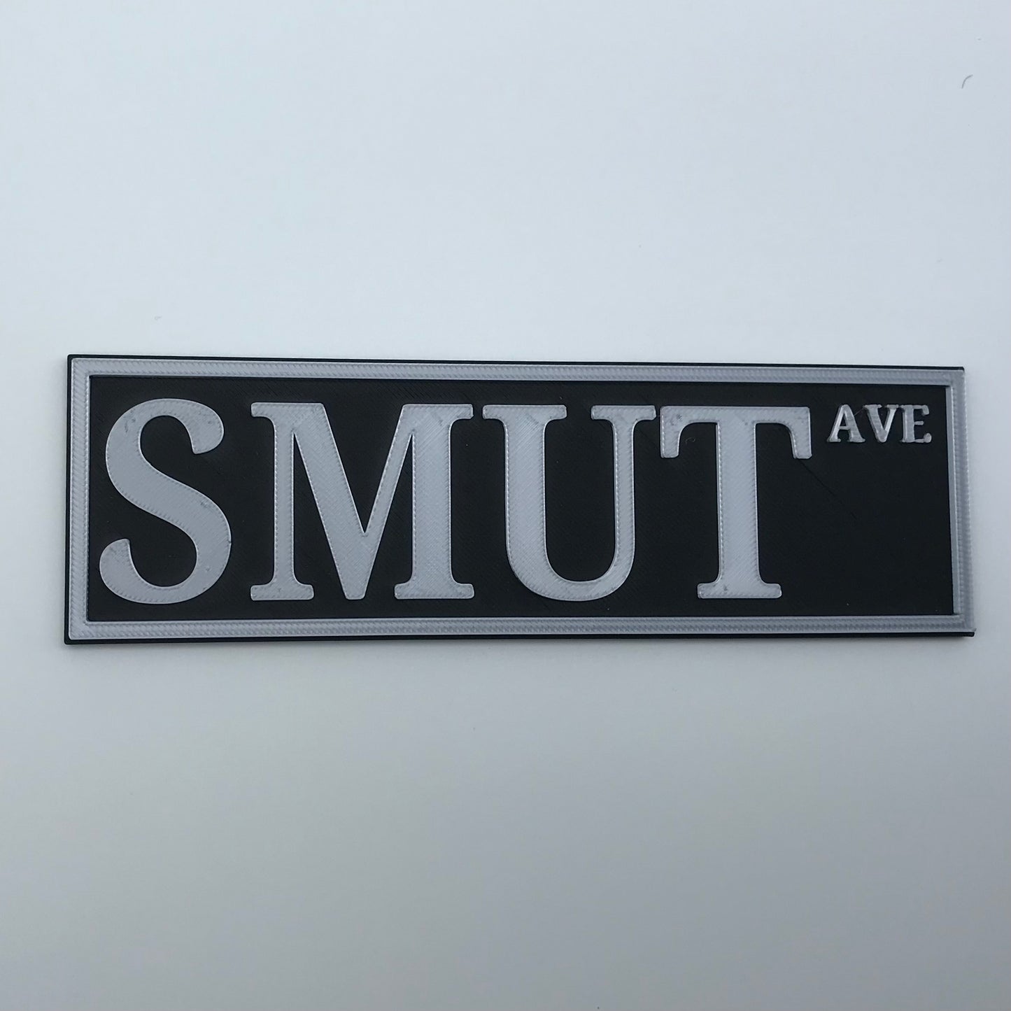 Smut Ave Bookshelf Sign